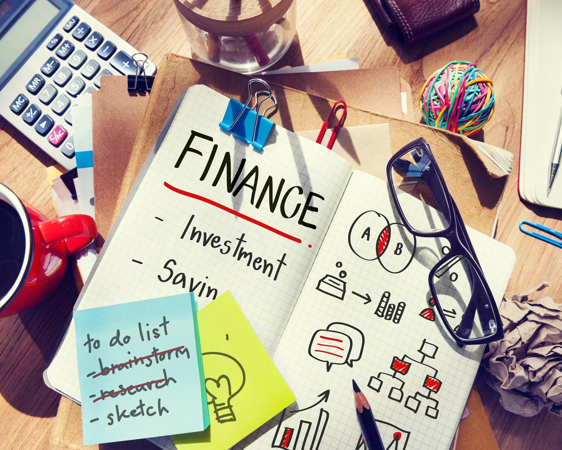 Financial planning and investment concept with notes and office stationery